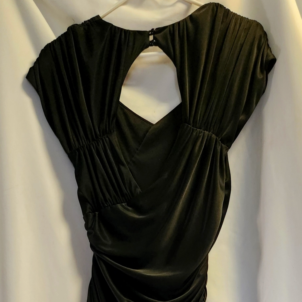 Slinky little back dress. Keyhole opening in back